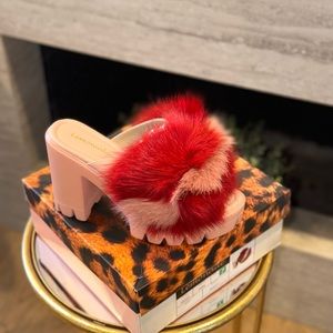 Brand New + never worn + original box. Step it up with these sassy wedges.